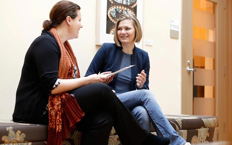 IU student talking to academic advisor.