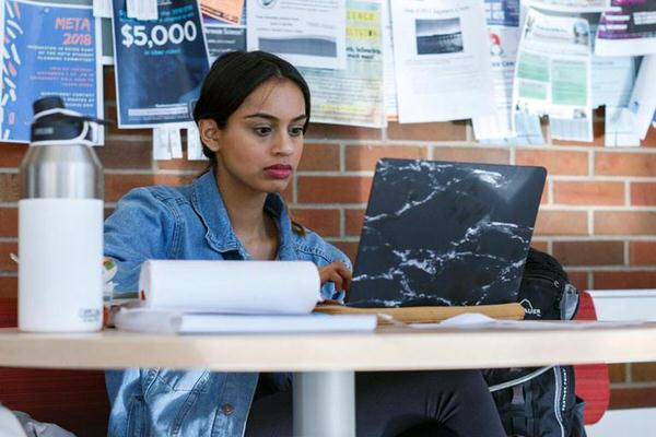 IUPUI student working at a computer.