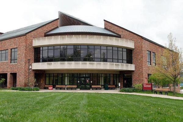 Brick building with rounded entrance on IU Southeast campus.