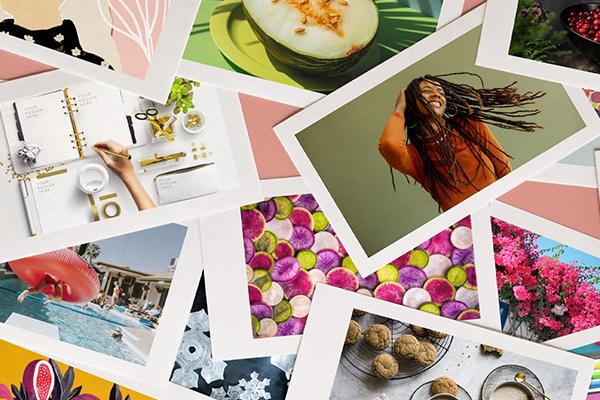 Photos are scattered over each other on a flat surface.