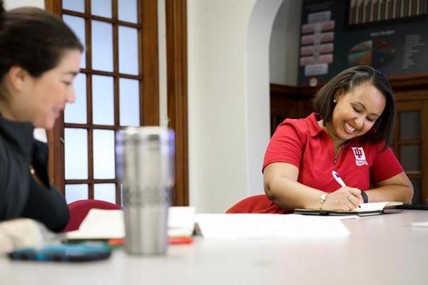 Financial advisor helping undergraduate student.