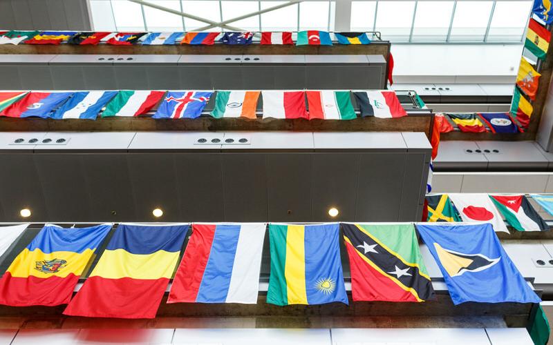 Flags of many nations hanging in atrium at IUPUI.