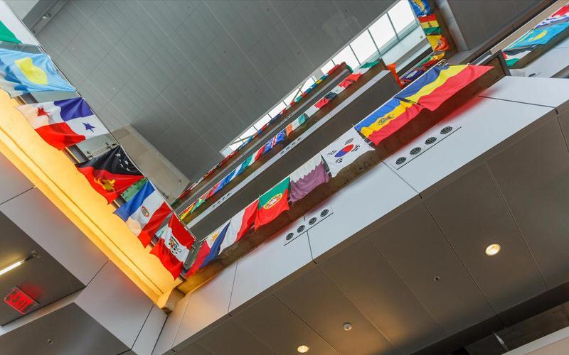 Flags of many nations hanging in atrium at IUPUI.