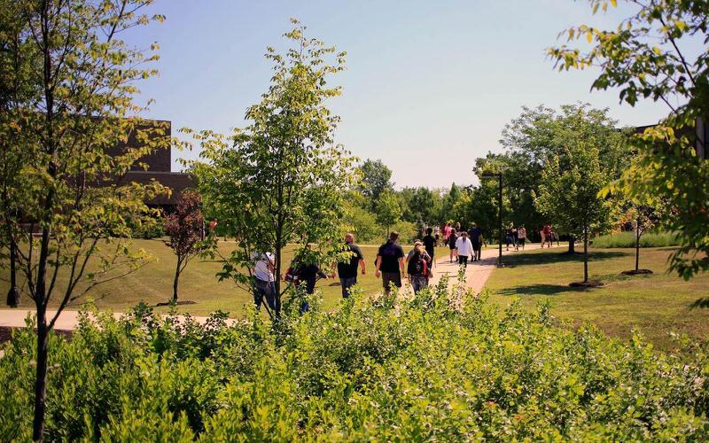 Students walking across the IU East campus.