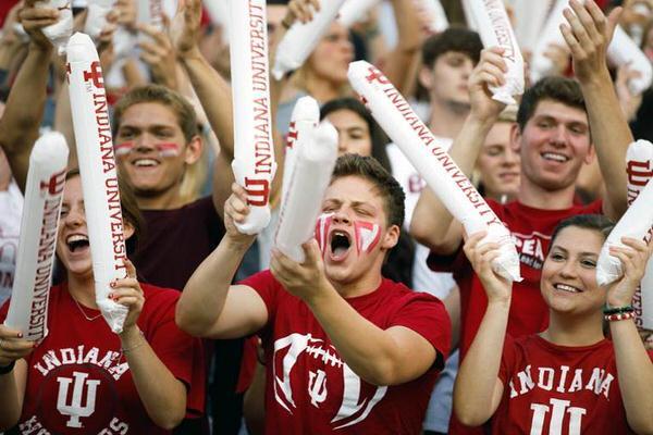 Students cheering at an IU basketball game.